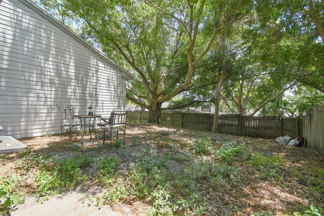 view of yard with a patio area