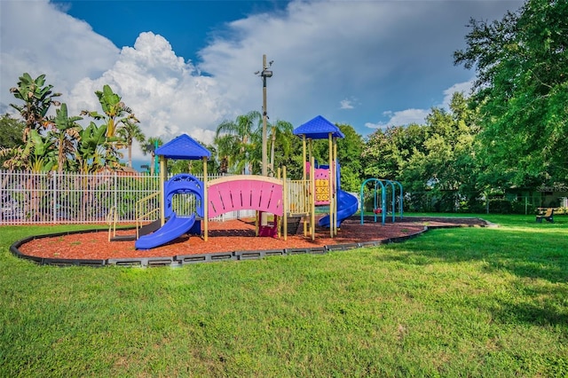 view of play area with a yard