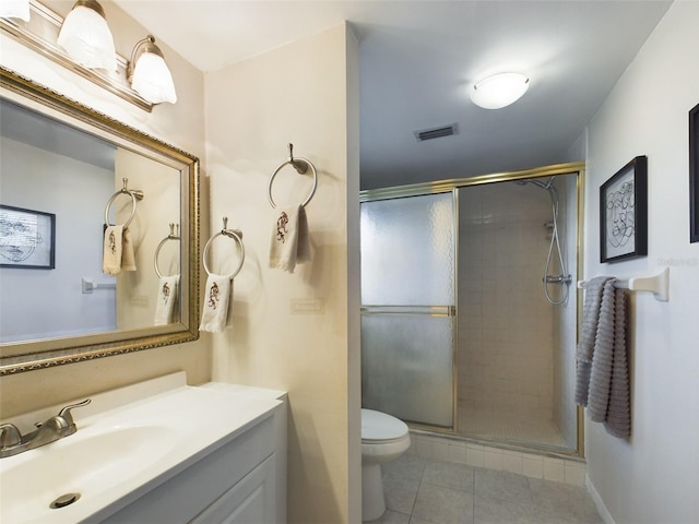 bathroom with walk in shower, toilet, tile flooring, and large vanity