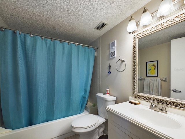 full bathroom featuring shower / bath combo, toilet, oversized vanity, and a textured ceiling