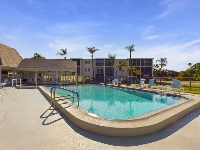 view of pool featuring a patio area