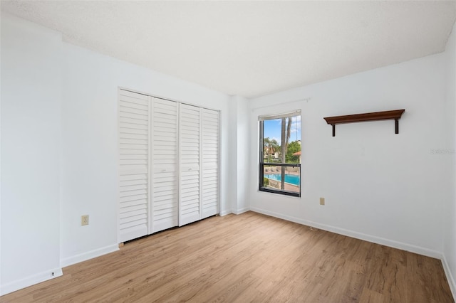 unfurnished bedroom featuring light hardwood / wood-style flooring