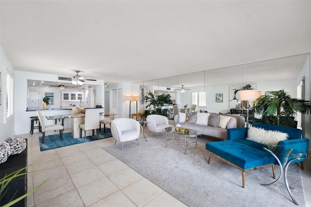 living room with light tile patterned flooring