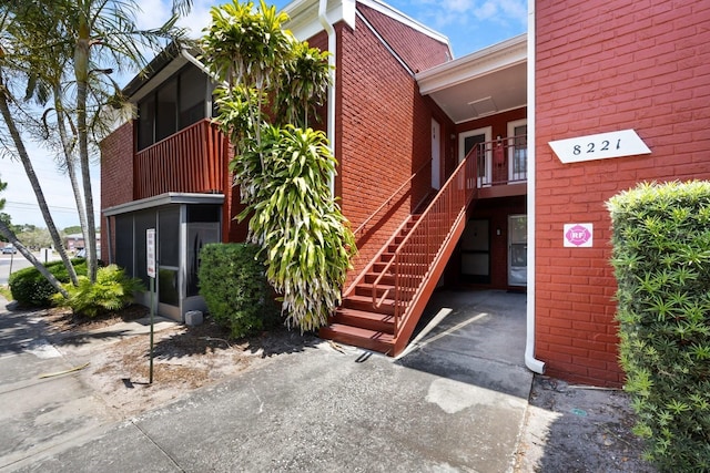 view of building exterior with stairs