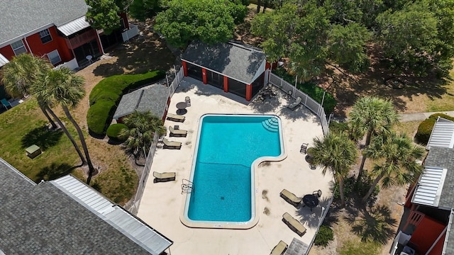 view of swimming pool with a patio