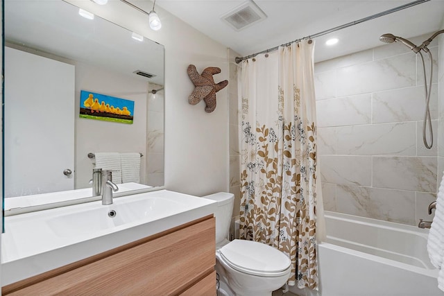 full bathroom featuring shower / bath combination with curtain, toilet, and large vanity