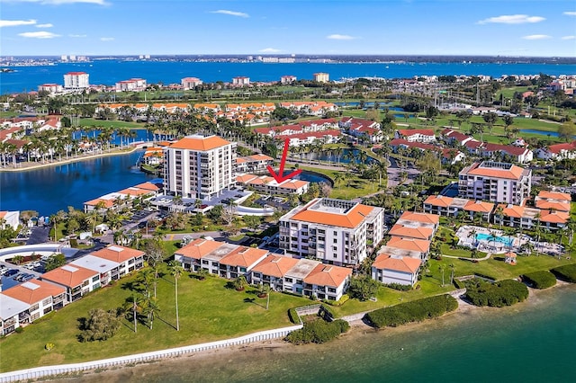 birds eye view of property featuring a water view