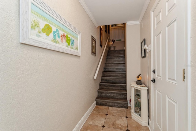 staircase with crown molding and tile floors