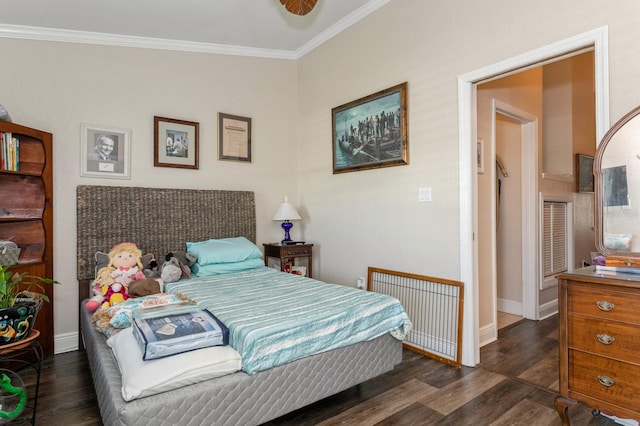 bedroom with dark wood-type flooring and ornamental molding