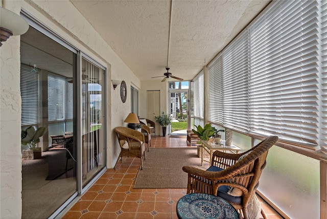 sunroom / solarium with ceiling fan