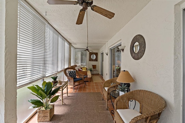 sunroom / solarium with ceiling fan