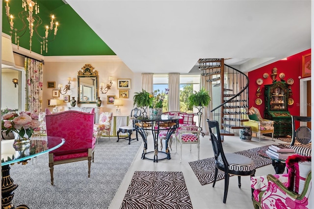 living room featuring a notable chandelier and crown molding