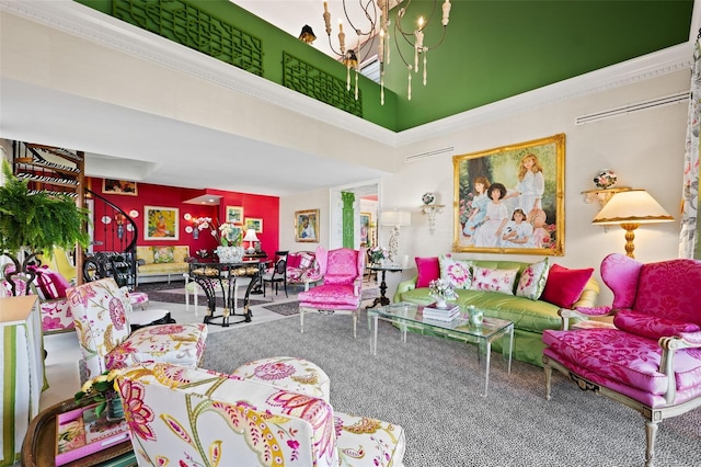 living room featuring a towering ceiling and an inviting chandelier