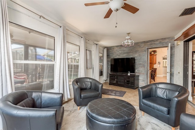 living room featuring ceiling fan