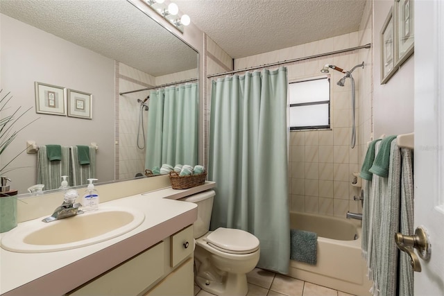 full bathroom featuring toilet, a textured ceiling, vanity, shower / bath combination with curtain, and tile patterned flooring