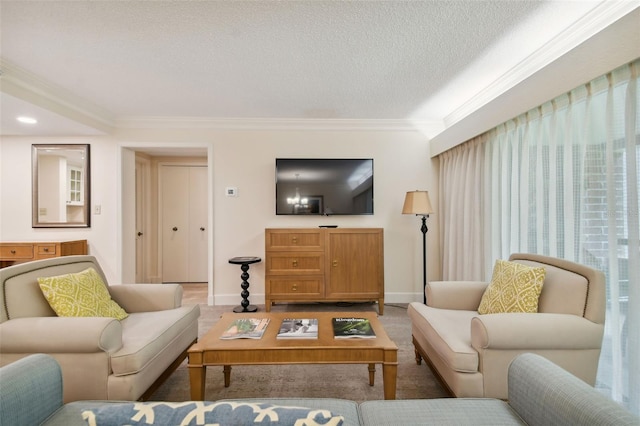 living room featuring a textured ceiling, carpet floors, and ornamental molding