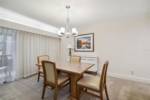 carpeted dining room featuring a textured ceiling, an inviting chandelier, and ornamental molding