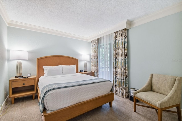 bedroom with a textured ceiling, carpet flooring, and ornamental molding