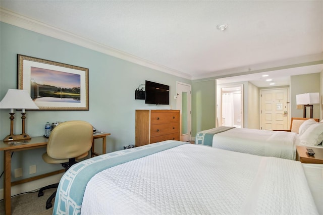 bedroom with ornamental molding