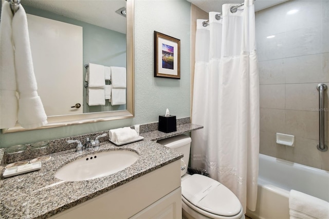 full bathroom featuring vanity, shower / bath combination with curtain, and toilet