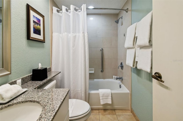 full bathroom with tile floors, vanity, toilet, and shower / bath combo with shower curtain