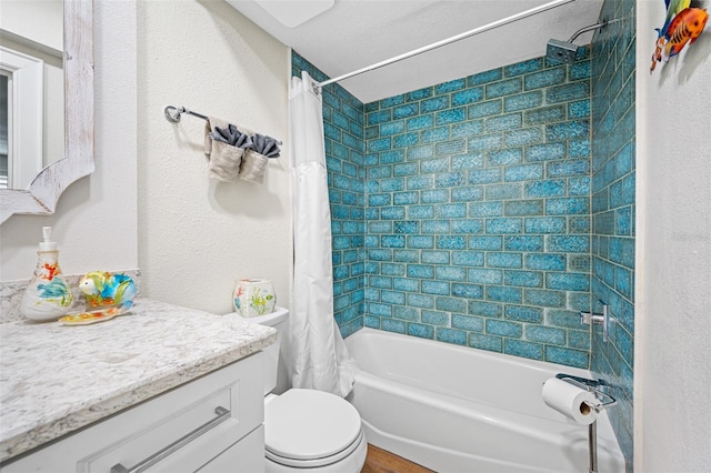 full bathroom with vanity, toilet, and shower / bath combo with shower curtain