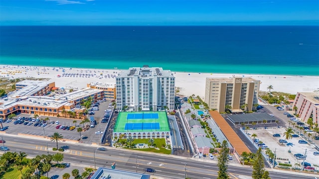 bird's eye view with a beach view and a water view