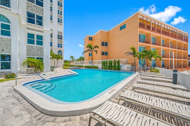 view of pool featuring a patio area