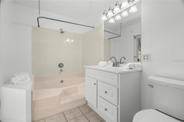 full bathroom with tile patterned floors, toilet, vanity, and washtub / shower combination