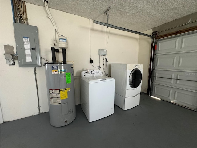 laundry room featuring water heater, washing machine and dryer, a textured ceiling, a garage, and electric panel