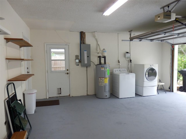 garage featuring a garage door opener, washer and clothes dryer, electric water heater, and electric panel