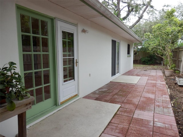 view of patio featuring fence