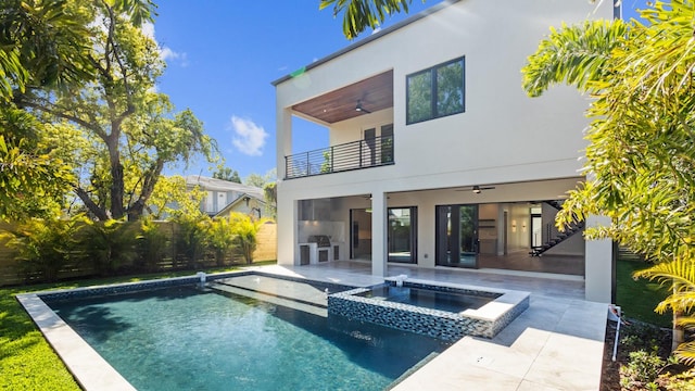 view of pool featuring a patio area and ceiling fan