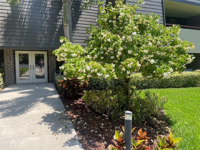 entrance to property featuring french doors