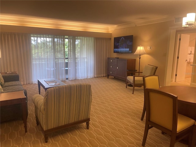 living room with crown molding and light carpet