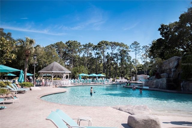 view of swimming pool with a gazebo