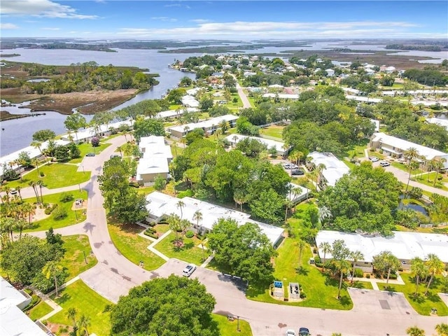 drone / aerial view with a water view