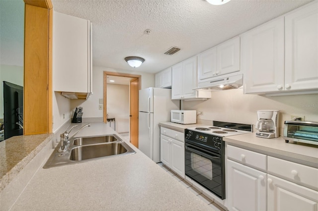 kitchen with a textured ceiling, white appliances, white cabinetry, and sink