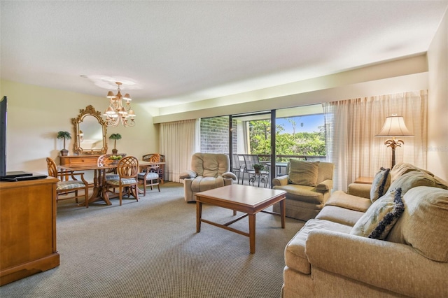 carpeted living room with an inviting chandelier and a textured ceiling