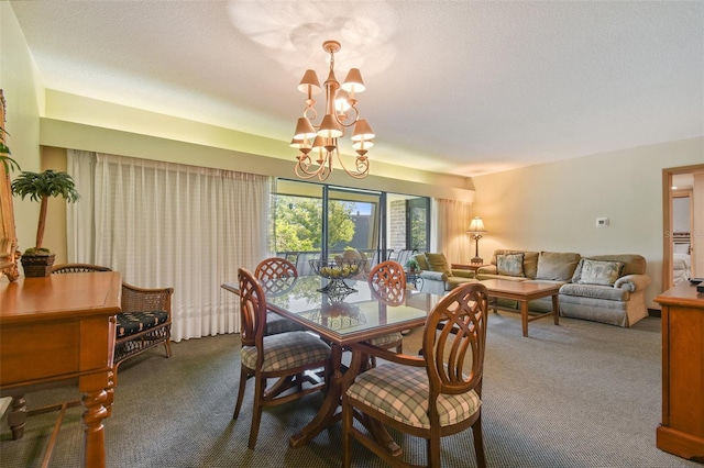36750 US Highway 19 N Unit 22208, Palm Harbor, FL 34684 - carpeted dining room with a textured ceiling and a chandelier