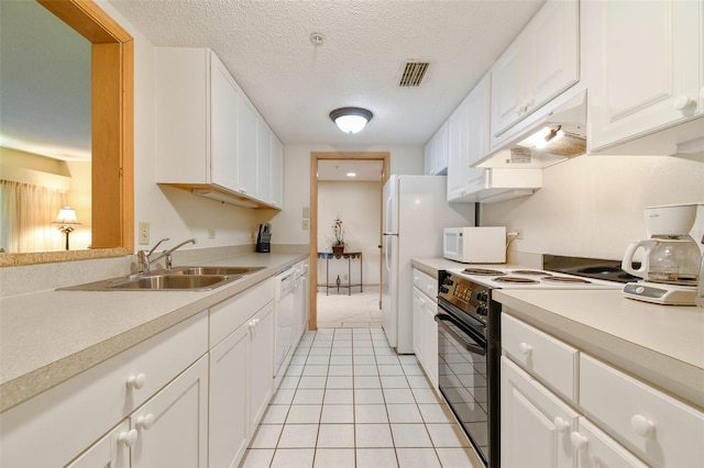 kitchen with ventilation hood, white appliances, white cabinetry, and sink