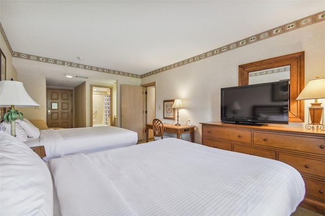 36750 US Highway 19 N Unit 22208, Palm Harbor, FL 34684 - bedroom featuring ensuite bathroom