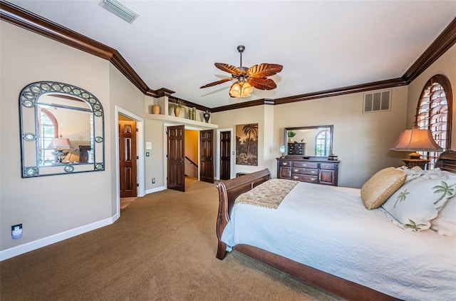 bedroom with carpet, ornamental molding, and ceiling fan