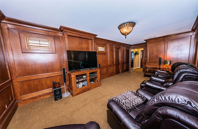 living room featuring crown molding, a textured ceiling, wood walls, and light carpet