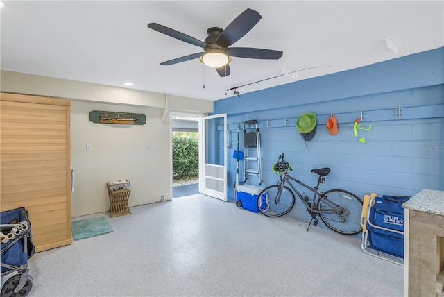 misc room with ceiling fan and rail lighting