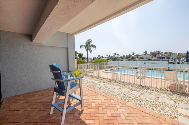 view of patio with a fenced in pool