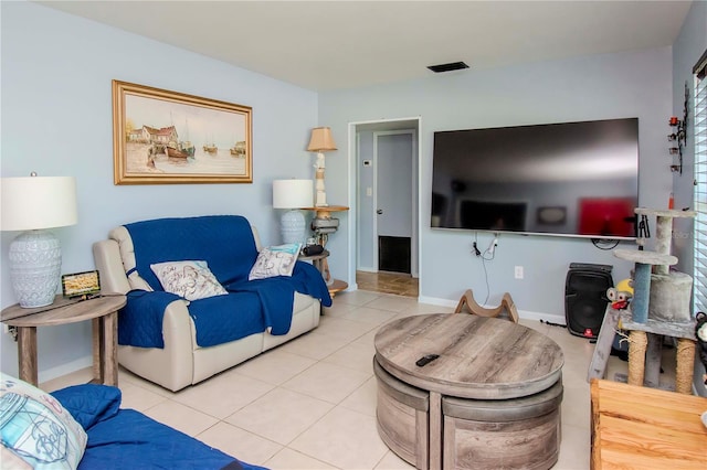 living room with light tile patterned floors