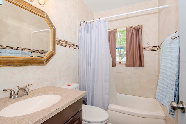 full bathroom featuring tile walls, backsplash, shower / bath combo with shower curtain, vanity, and toilet