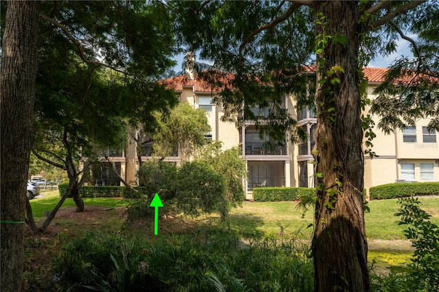 exterior space featuring a lawn