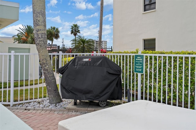 view of terrace with a grill